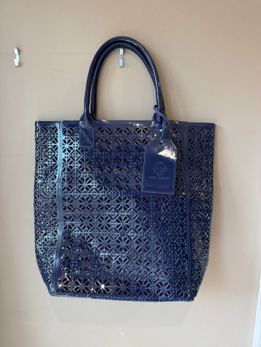Patent Laser-Cut Navy Tote with Branded Tag